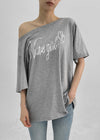 Lukua Lettering One-Shoulder Short Sleeve Tee